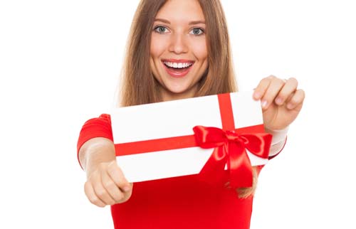 woman holding a gift certificate